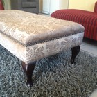 Ottoman upholstered in fabric from Hertex